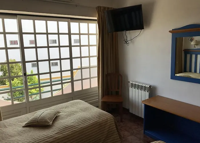 Residencial Colaco Апартаменты